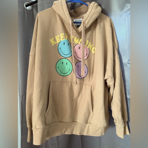 American Eagle Outfitters Tops - American Eagle Outfitters Tan Hoodie with Multicolor Smiley Graphic